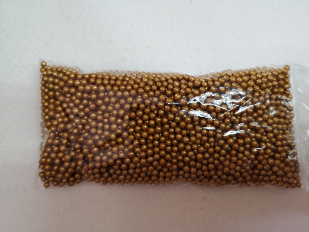 Mostacilla pelotita dorada 50 gramos